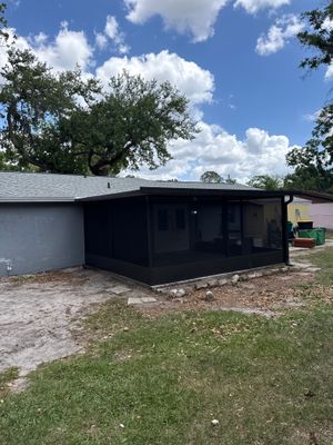 Wide exterior view of Drome Contracting room addition work